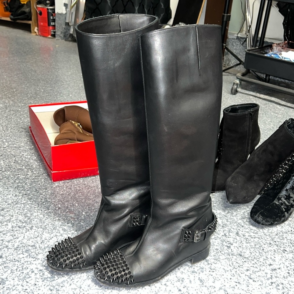 black spiked boots from christian louboutin, slightly used